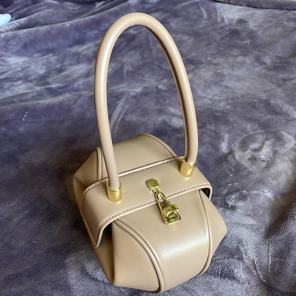 Beige small dumpling hobo bag I purchased brand new and never used. - Picture 2 of 11